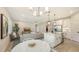 Bright, open living area with kitchen, dining, and living room, perfect for entertaining at 491 Daylily Blvd, Nokomis, FL 34275