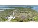 Aerial view of a park area with walking trails and a water inlet at 5415 13Th Avenue W Dr, Bradenton, FL 34209
