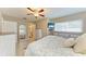 Comfortable bedroom with ample natural light, a ceiling fan, and neutral walls at 5415 13Th Avenue W Dr, Bradenton, FL 34209
