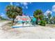 Holmes Beach Anna Maria Island sign with tropical landscaping and a coastal vibe at 5415 13Th Avenue W Dr, Bradenton, FL 34209