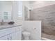 Modern bathroom featuring a glass shower and stylish vanity with great natural light at 5630 Inspiration Ter, Bradenton, FL 34210