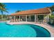 Inviting community pool with ample seating and a well-maintained pool house at 5630 Inspiration Ter, Bradenton, FL 34210