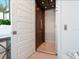 Interior elevator with wood paneling, metal gate, and recessed lights for convenient access to all levels of the home at 5630 Inspiration Ter, Bradenton, FL 34210