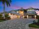 Elegant multi-car garage home with neutral colors and beautifully paved driveway at 5630 Inspiration Ter, Bradenton, FL 34210