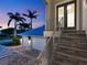 Stairway with view of the garages at 5630 Inspiration Ter, Bradenton, FL 34210