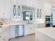 Well-appointed kitchen with stainless steel appliances, custom cabinetry, and a decorative backsplash at 5630 Inspiration Ter, Bradenton, FL 34210