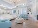 Open living space with comfortable seating, elegant lighting, and an inviting atmosphere at 5630 Inspiration Ter, Bradenton, FL 34210