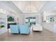 Bright living room with modern decor, light wood floors, and an open concept design at 5630 Inspiration Ter, Bradenton, FL 34210