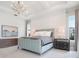 Serene main bedroom with ample lighting, neutral colors, and elegant furnishings at 5630 Inspiration Ter, Bradenton, FL 34210