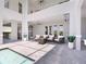 Spacious patio with outdoor furniture and a view of the manicured backyard and pool at 5630 Inspiration Ter, Bradenton, FL 34210