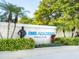 Entrance to IMG Academy in Bradenton, Florida featuring lush landscaping and a welcoming sign at 5630 Inspiration Ter, Bradenton, FL 34210
