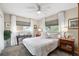Bedroom with natural light, ceiling fan and neutral colored walls at 5685 36Th N Ave, St Petersburg, FL 33710