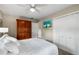 Cozy bedroom featuring closet space, soft lighting, and comfortable carpeting at 5685 36Th N Ave, St Petersburg, FL 33710