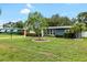 A charming single-story home with a well-maintained lawn and attractive landscaping at 5685 36Th N Ave, St Petersburg, FL 33710