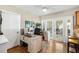 Home office space with hardwood floors, a desk, and sliding glass doors at 5685 36Th N Ave, St Petersburg, FL 33710