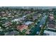 Waterfront home with tile roof, pool, dock, and boat lift in a coastal community at 571 Birdie Ln, Longboat Key, FL 34228