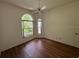 Bedroom with two large windows with views at 5803 Garden Lakes Palm, Bradenton, FL 34203