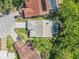 Aerial view of the property showcasing the pool, backyard, landscaping and the surrounding neighborhood at 6065 Marella Ct, Sarasota, FL 34243