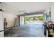 Spacious two-car garage with ample storage space and a view of the well maintained front yard at 6065 Marella Ct, Sarasota, FL 34243