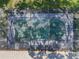 Aerial view of screened-in pool with surrounding patio; a refreshing outdoor oasis at 6065 Marella Ct, Sarasota, FL 34243
