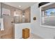 Bright bathroom with glass enclosed shower at 616 Dogwood Run, Bradenton, FL 34212