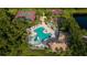 Aerial view of community amenities including pool, playground, tennis, and basketball courts at 616 Dogwood Run, Bradenton, FL 34212