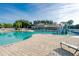 Resort-style pool with slide, play area, and splash pad providing fun for all ages in a beautiful community setting at 616 Dogwood Run, Bradenton, FL 34212