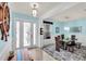 Inviting dining area featuring modern decor, elegant lighting, and stylish furnishings creating an appealing atmosphere at 616 Dogwood Run, Bradenton, FL 34212