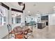 Cozy dining nook open to kitchen and living room at 616 Dogwood Run, Bradenton, FL 34212