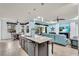 Open-concept kitchen with views into the living room and lanai at 616 Dogwood Run, Bradenton, FL 34212