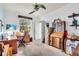 Office space featuring built-in shelving, a wooden desk, and a bright window at 616 Dogwood Run, Bradenton, FL 34212