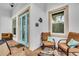 Cozy outdoor patio area with comfortable seating and decorative accents, perfect for relaxation at 616 Dogwood Run, Bradenton, FL 34212