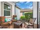 Outdoor seating area offering a cozy and private space for relaxation and enjoying the surrounding scenery at 616 Dogwood Run, Bradenton, FL 34212