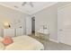 Bright bedroom with a vanity and neutral tones at 6318 Rivo Lakes Blvd, Sarasota, FL 34241