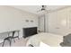 Bedroom featuring plush carpet, modern furniture, and ample closet space at 6318 Rivo Lakes Blvd, Sarasota, FL 34241