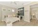 Cozy bedroom with a built-in desk area, creating a functional workspace and a comfortable resting area at 6318 Rivo Lakes Blvd, Sarasota, FL 34241