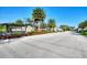 Welcome to Rivo Lakes, a community with lush landscaping and a welcoming entrance at 6318 Rivo Lakes Blvd, Sarasota, FL 34241
