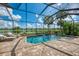 Inviting screened-in pool with a tranquil lake view, ideal for relaxation at 6318 Rivo Lakes Blvd, Sarasota, FL 34241
