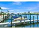Boats docked along the waterway on a bright, sunny day at 655 Spanish Way, Longboat Key, FL 34228