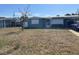 Modest single-story home with simple landscaping and a covered carport for convenient parking at 6803 Washington Pl, Bradenton, FL 34207