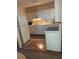 Efficient kitchen with white appliances and matching cabinets at 6803 Washington Pl, Bradenton, FL 34207