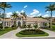 Inviting home featuring a well-manicured lawn and classic architectural details at 7144 Ashland Gln, Lakewood Ranch, FL 34202