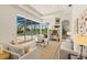 Spacious living room with sliding glass doors to the screened pool and patio area at 7144 Ashland Gln, Lakewood Ranch, FL 34202