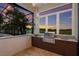 Outdoor kitchen features stainless steel grill, granite countertop, and ample cabinet space at 7144 Ashland Gln, Lakewood Ranch, FL 34202