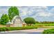 Community entrance sign amidst lush landscaping, offering a picturesque welcome to residents at 7144 Ashland Gln, Lakewood Ranch, FL 34202