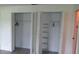 White closets featuring ample storage space with shelving and rods for organization at 7157 Fairway Bend Cir, Sarasota, FL 34243