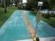 Residents can enjoy shuffleboard outdoors in this community at 7157 Fairway Bend Cir, Sarasota, FL 34243