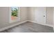 Bedroom featuring light walls, and trim, with a window view at 719 22Nd W St, Bradenton, FL 34205