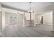 Spacious living room featuring new flooring, neutral paint, and lots of natural light at 719 22Nd W St, Bradenton, FL 34205