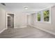 Inviting living room filled with natural light, and featuring views into an adjacent bathroom at 719 22Nd W St, Bradenton, FL 34205